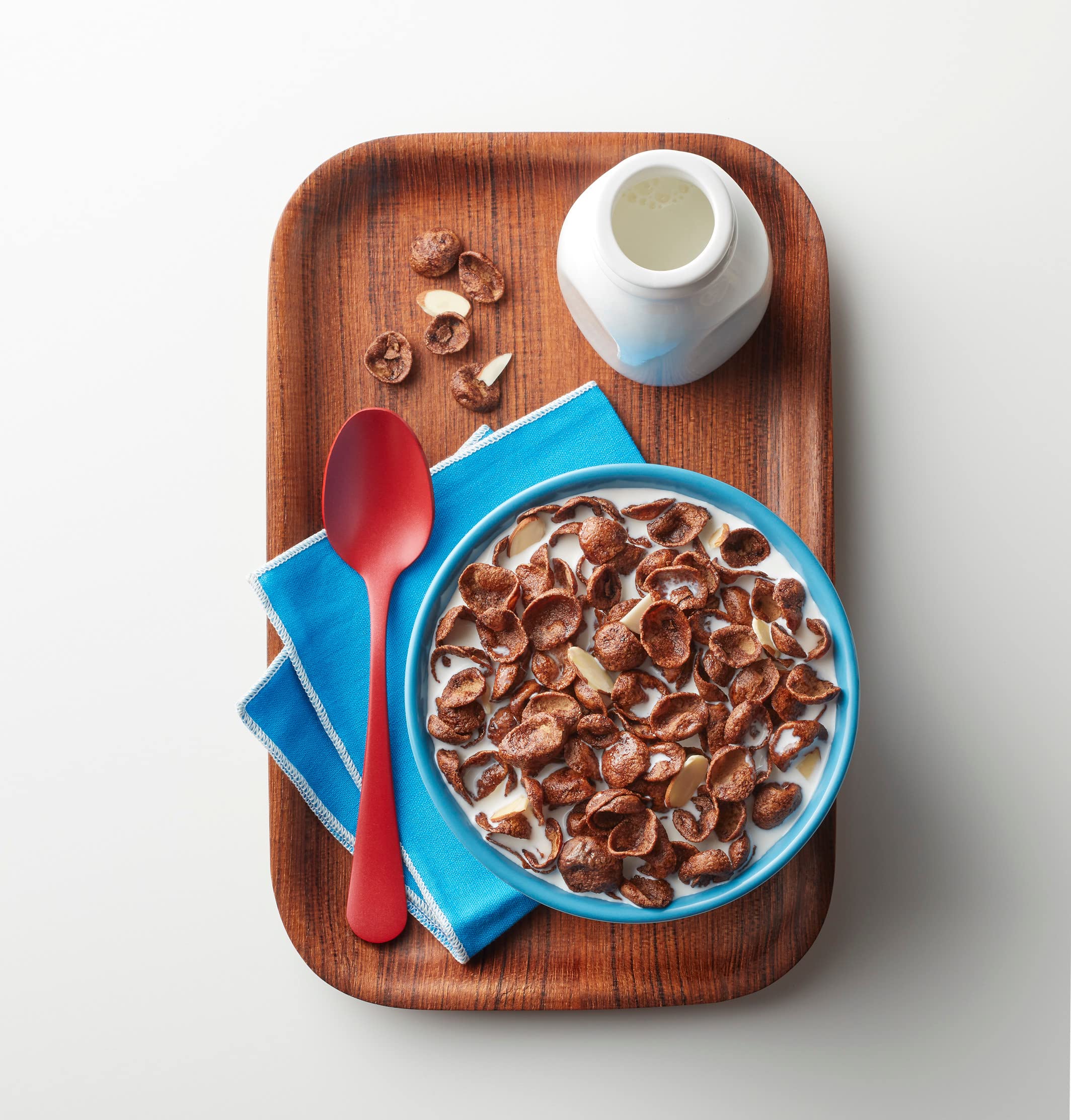 Premier Protein Chocolate Almond Cereal flakes close-up with chocolatey flavor.