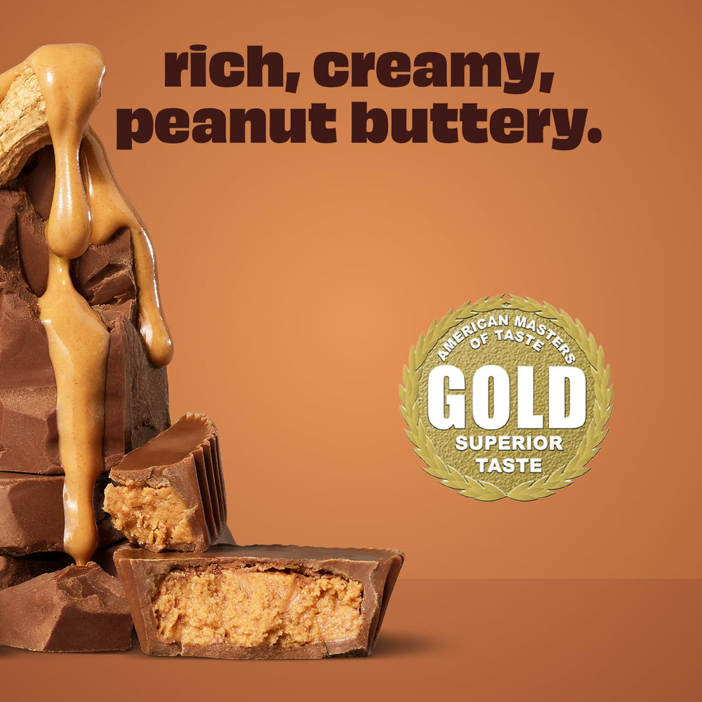 Glass of Premier Protein Shake Chocolate Peanut Butter showing creamy texture
