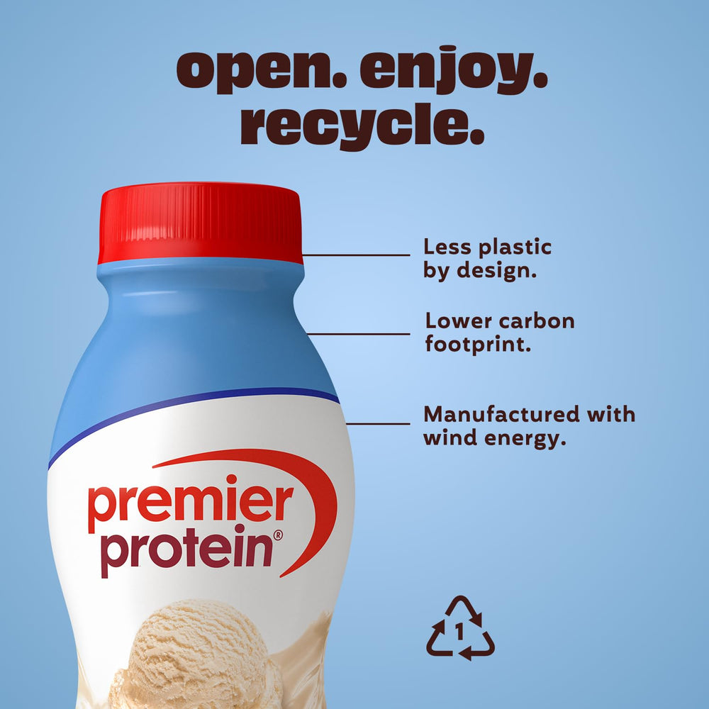Hand holding Premier Protein Shake Vanilla for portable nutrition.