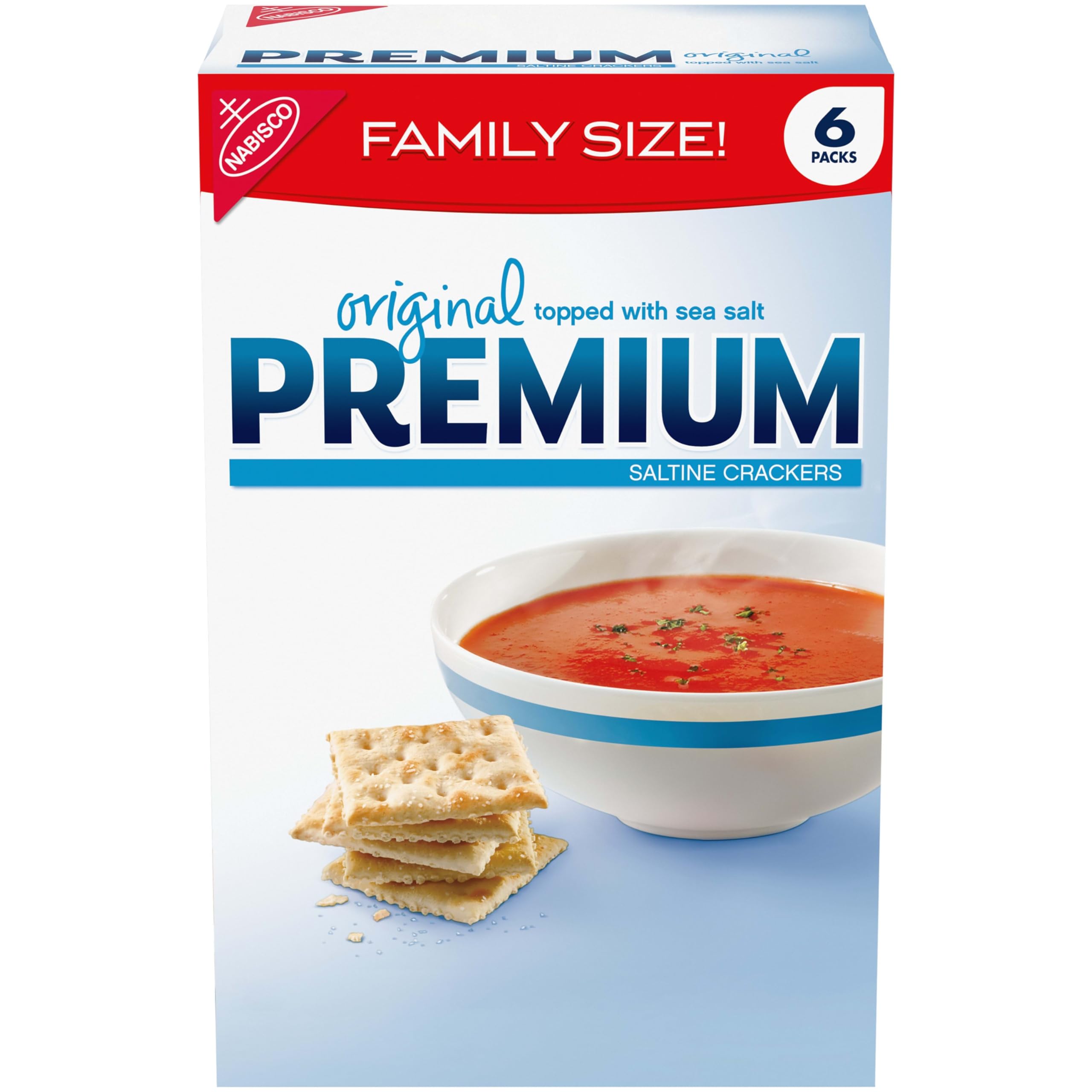 Premium Original Saltine Crackers packaging on a shelf for family-sized snacks.