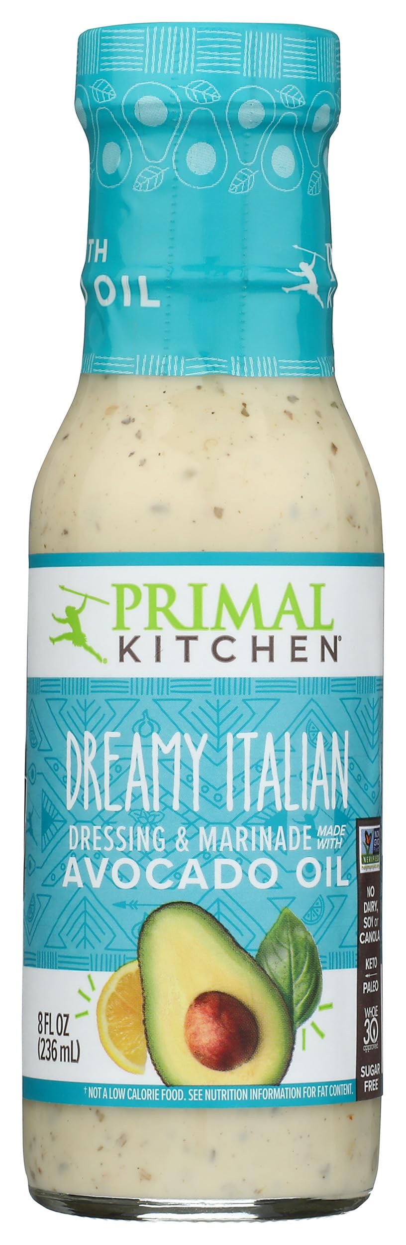 Primal Kitchen Dreamy Italian dressing bottle pour enhances salads with bright, zesty flavor.