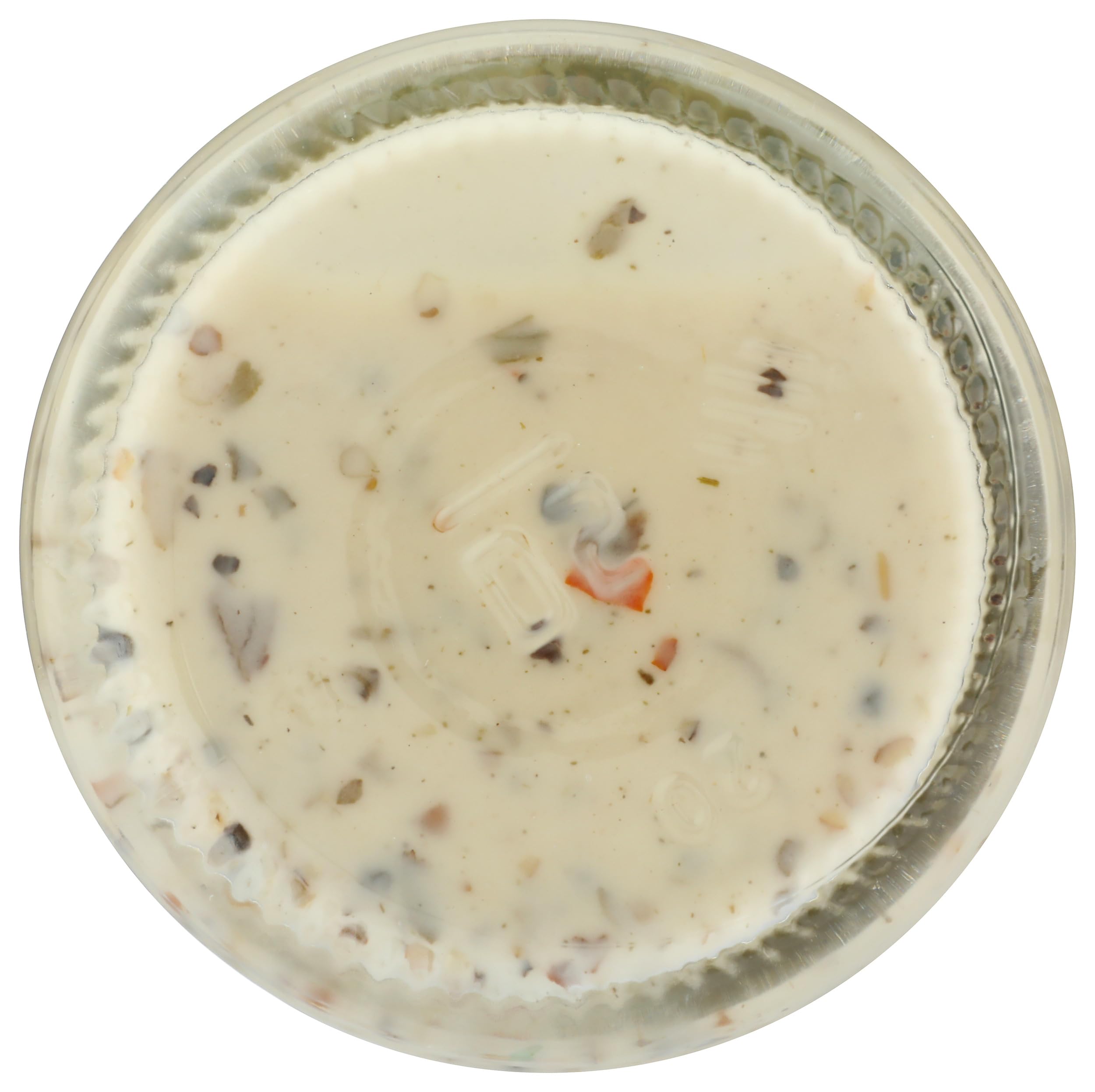 Primal Kitchen Dreamy Italian dressing on dining table signals easy family meals.