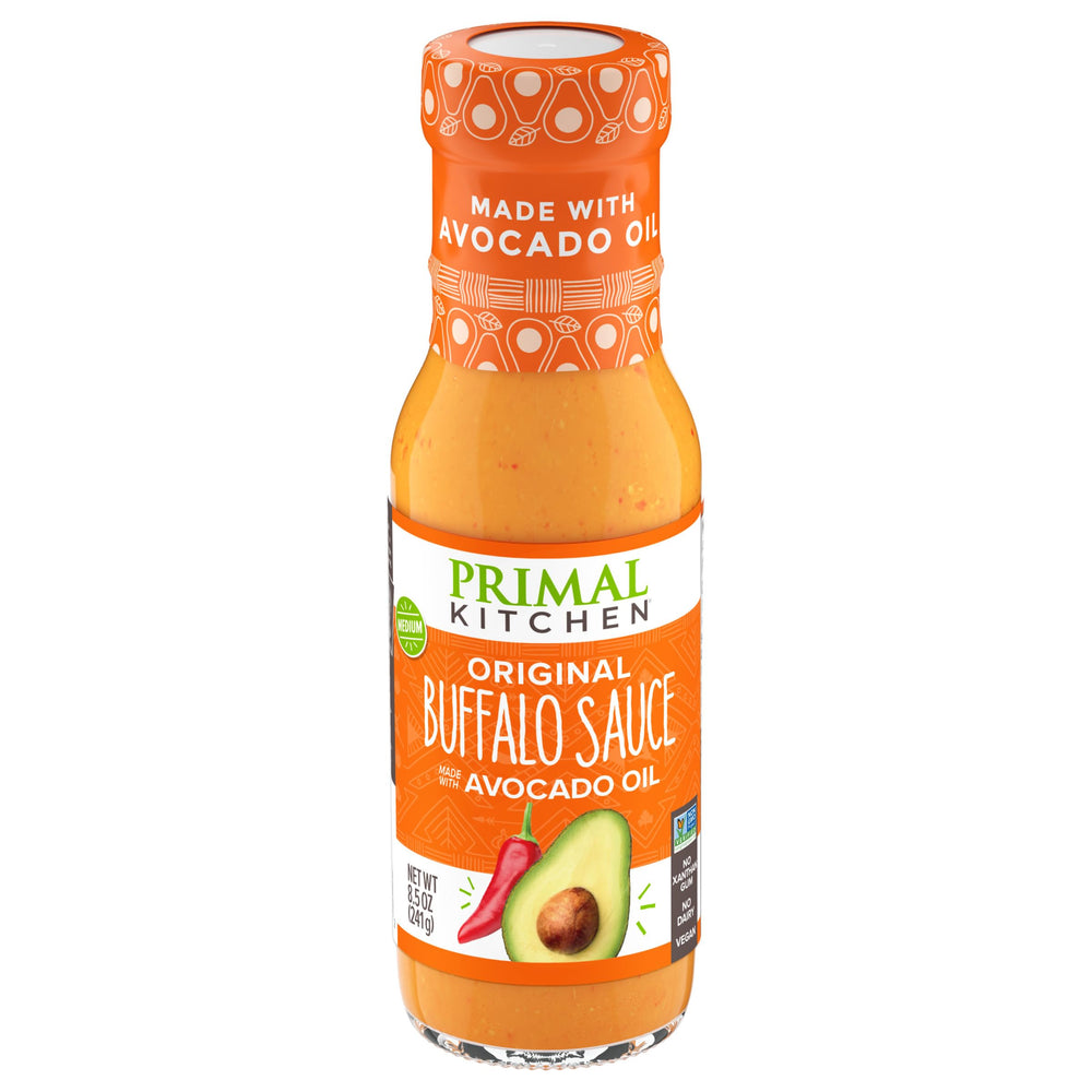 Primal Kitchen No Dairy Buffalo Sauce bottle highlighting dairy-free, bold buffalo flavor for meals.