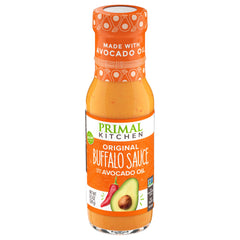Primal Kitchen No Dairy Buffalo Sauce bottle highlighting dairy-free, bold buffalo flavor for meals.