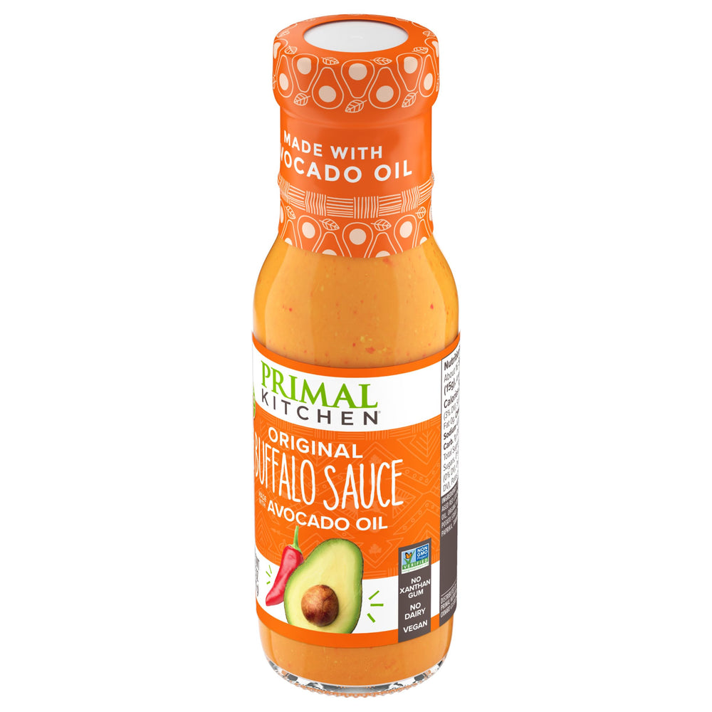 Primal Kitchen No Dairy Buffalo Sauce close-up highlighting creamy buffalo finish.