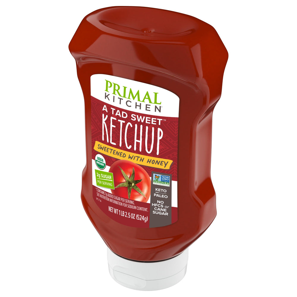Primal Kitchen Tad Sweet Ketchup in a clean-label jar on the counter