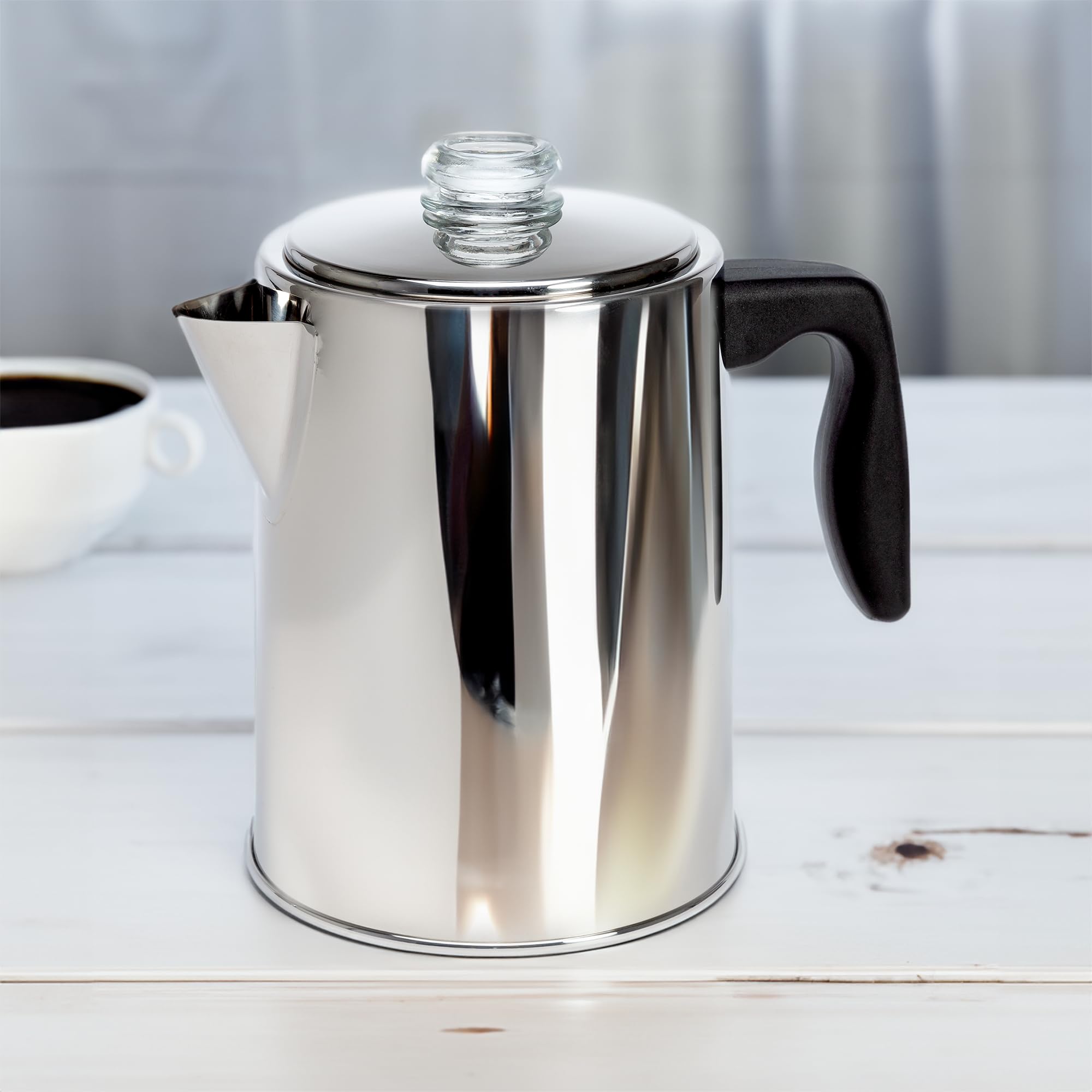 Camping-friendly stovetop coffee pot suitable for outdoors.