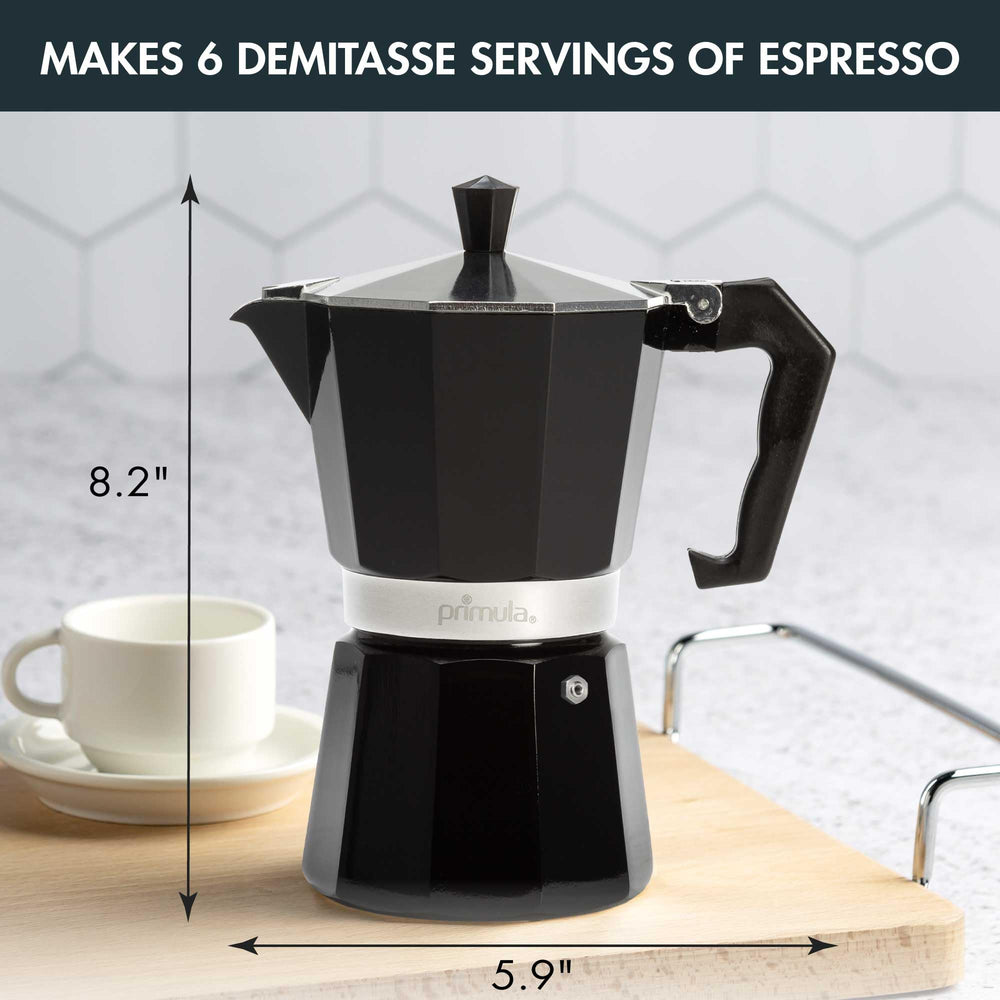 Primula Classic Moka Pot on stovetop bubbling espresso into the top chamber.