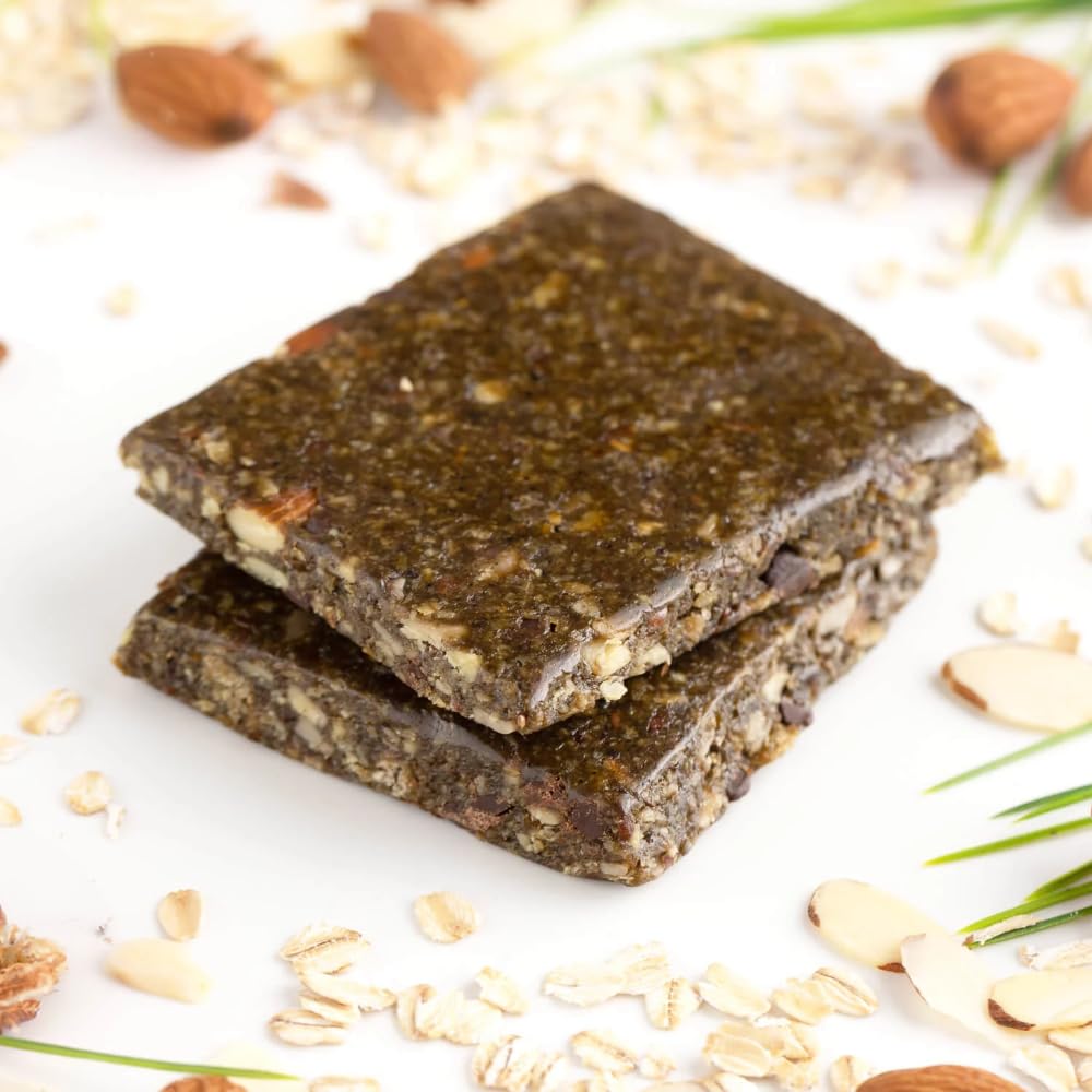 PROBAR Meal Bar Superfood Slam cross-section reveals oats, nuts, and seeds for natural energy.