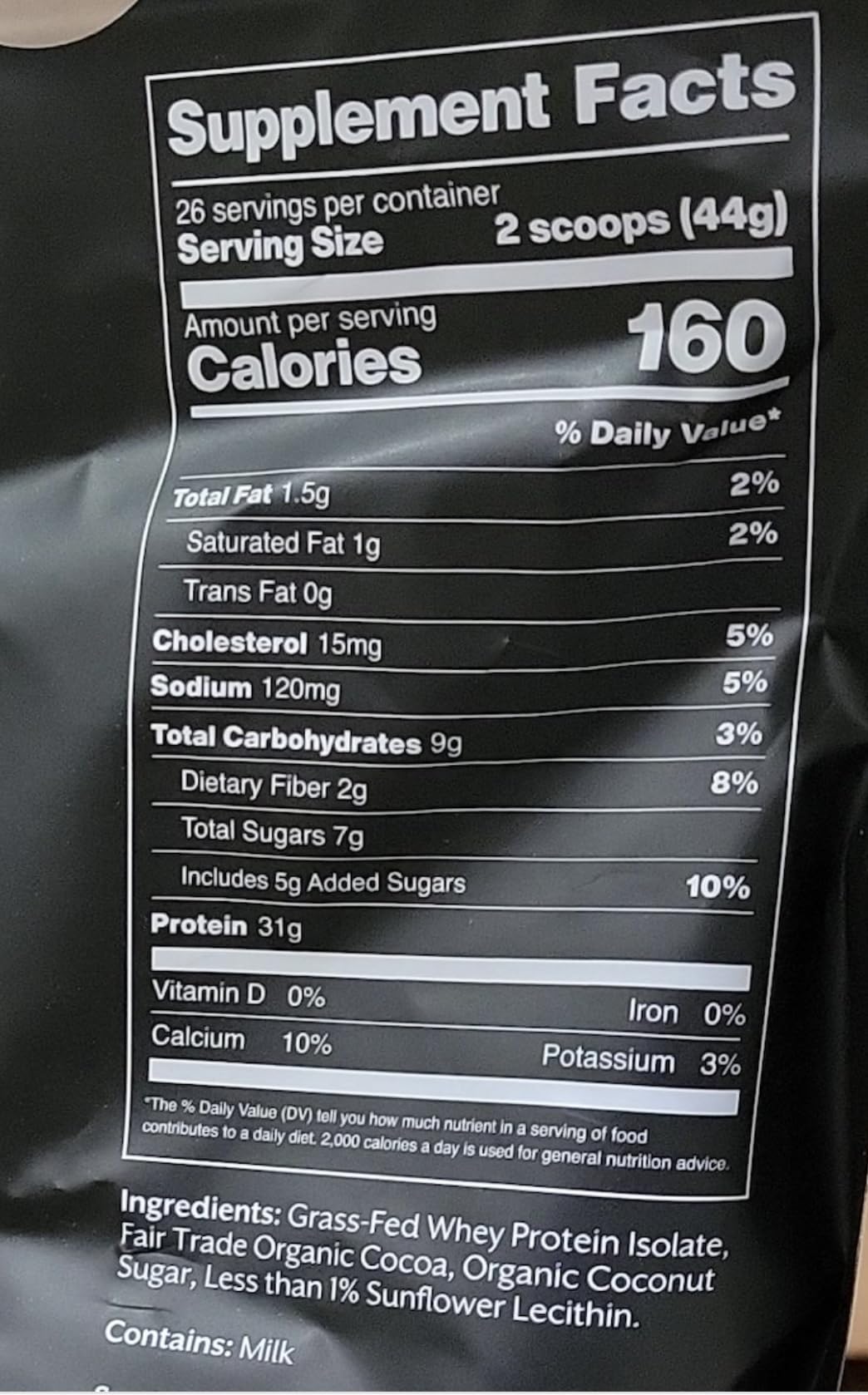 Promix Nutrition Whey Isolate Chocolate scoop illustrating precise serving control.