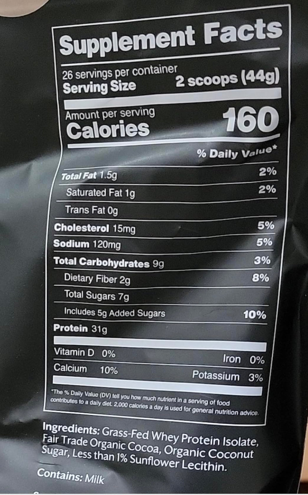 Promix Nutrition Whey Isolate Chocolate scoop illustrating precise serving control.