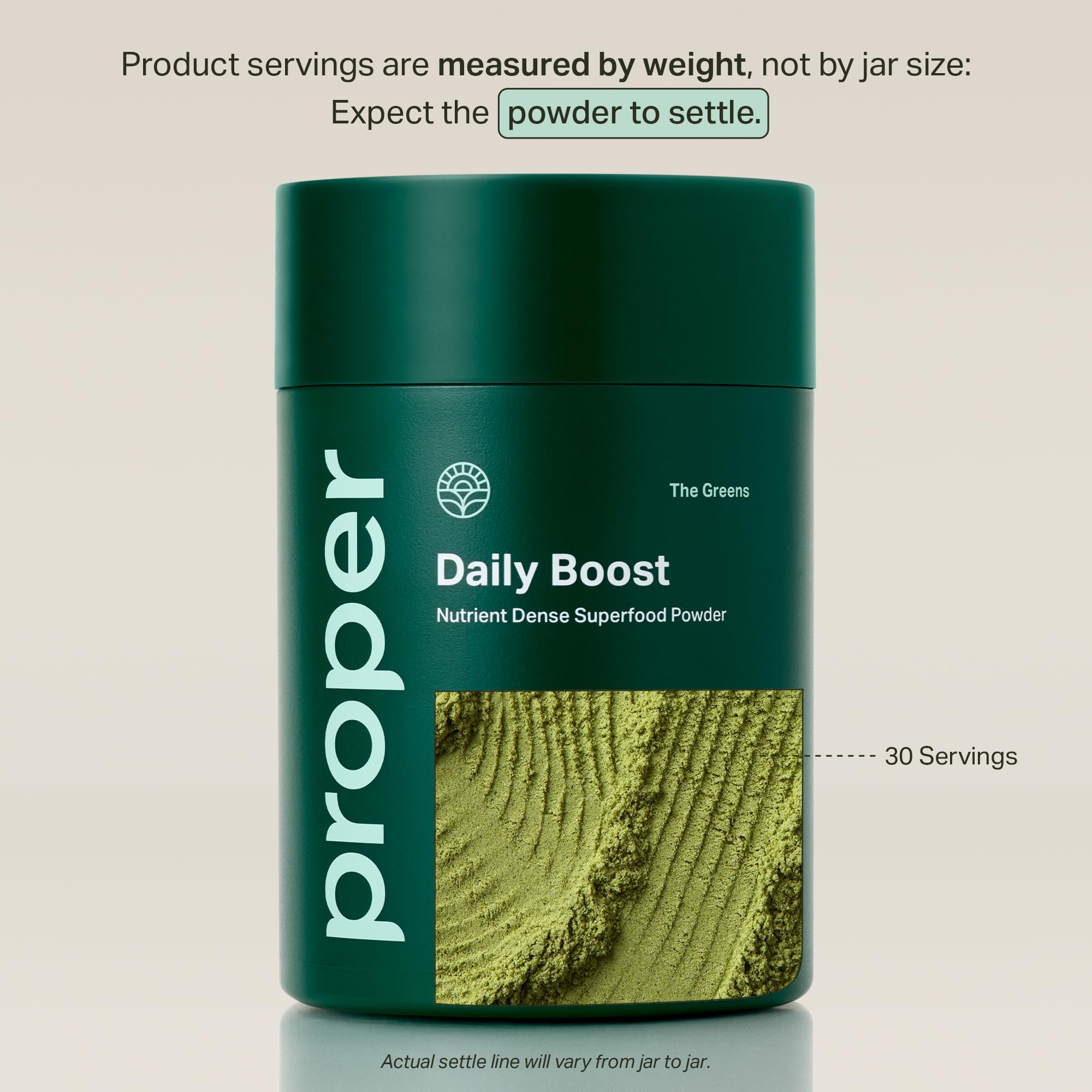 Scoop of Proper Greens powder blended into water for a quick healthy drink.