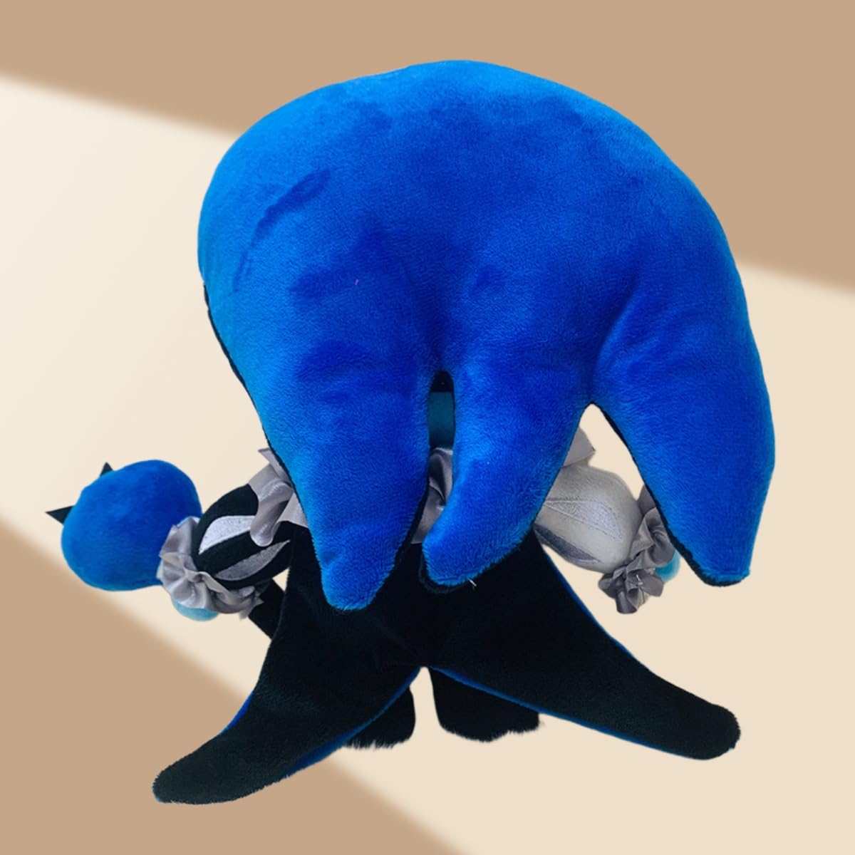 PRWLGFB Shadow Milk Cookie plush side view highlighting compact 9.8 inch size for desks.