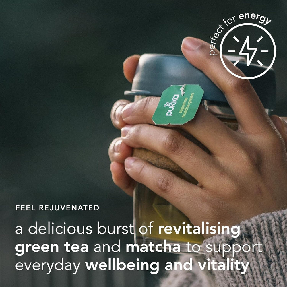 Cup with steaming emerald brew, caffeine-free energy for calm focus.