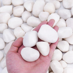 Pulovin white rocks 1-2 inch for garden beds add clean decorative charm.