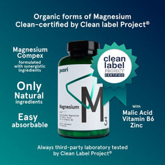 Closeup of Puori Magnesium Complex capsules highlighting easy-to-swallow vegan form.