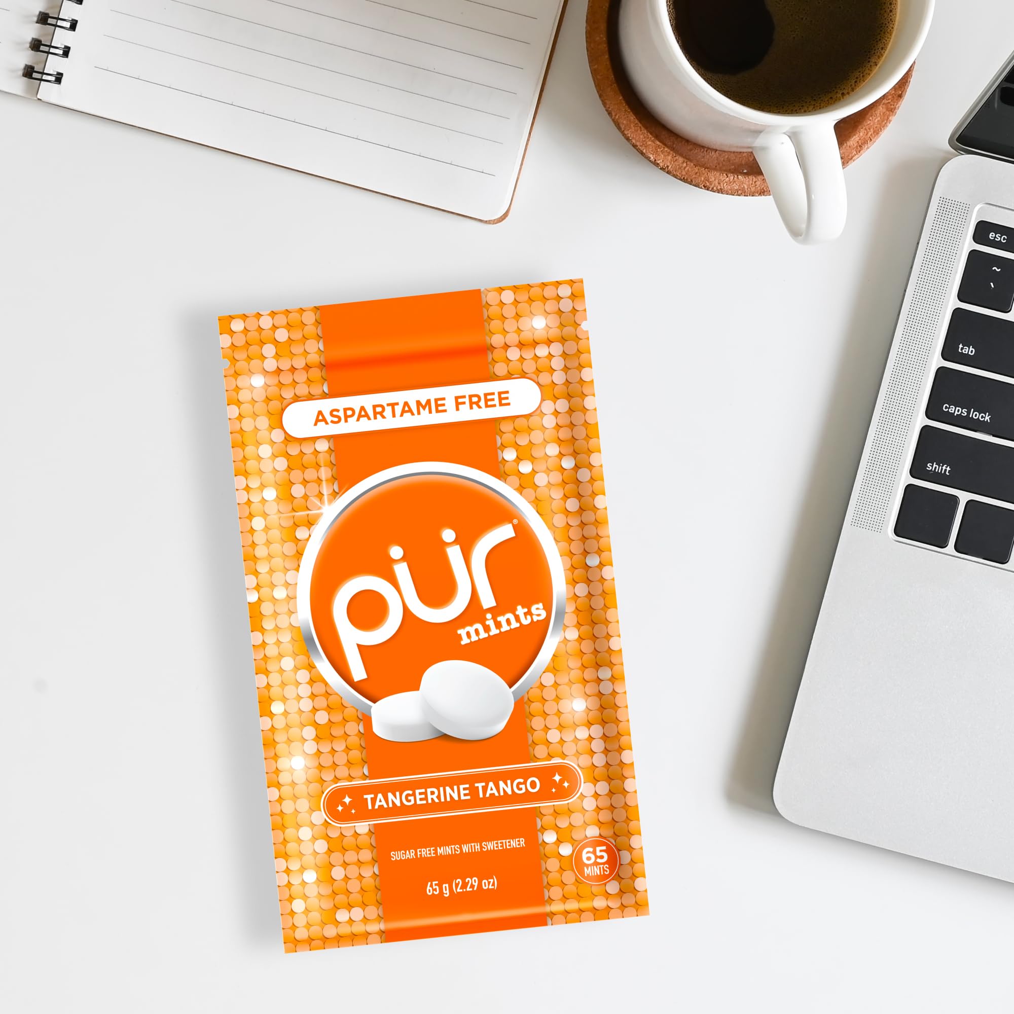 PUR Mints Tangerine Tango ingredients icon highlights xylitol sweetness.