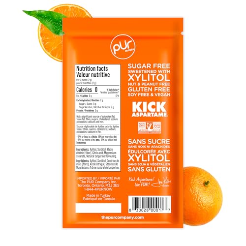 PUR Mints Tangerine Tango mint closeup showing tangy citrus flavor for quick breath refresh.