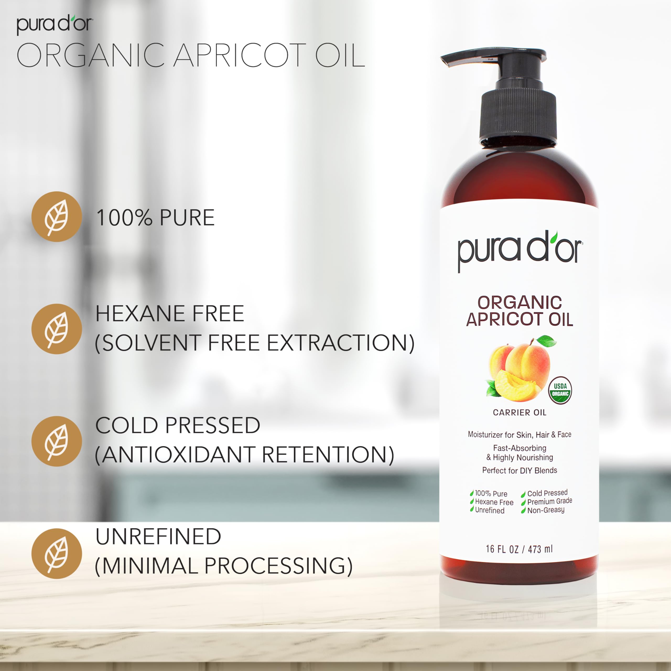 PURA D'OR apricot oil on face for gentle hydration and glow