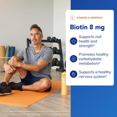 Pure Encapsulations Biotin bottle in a daily wellness routine setup