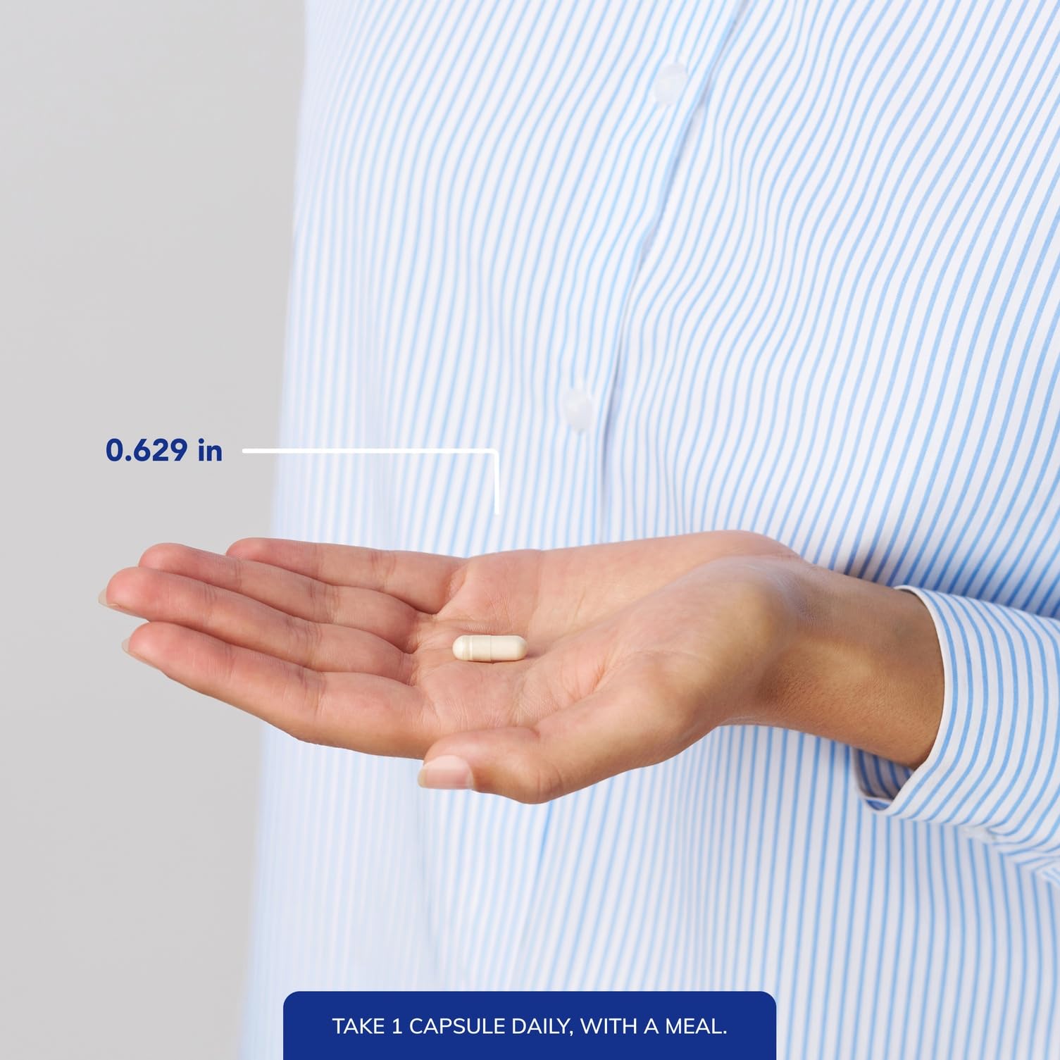 Pure Encapsulations DHEA bottle beside a glass of water for daily wellness.