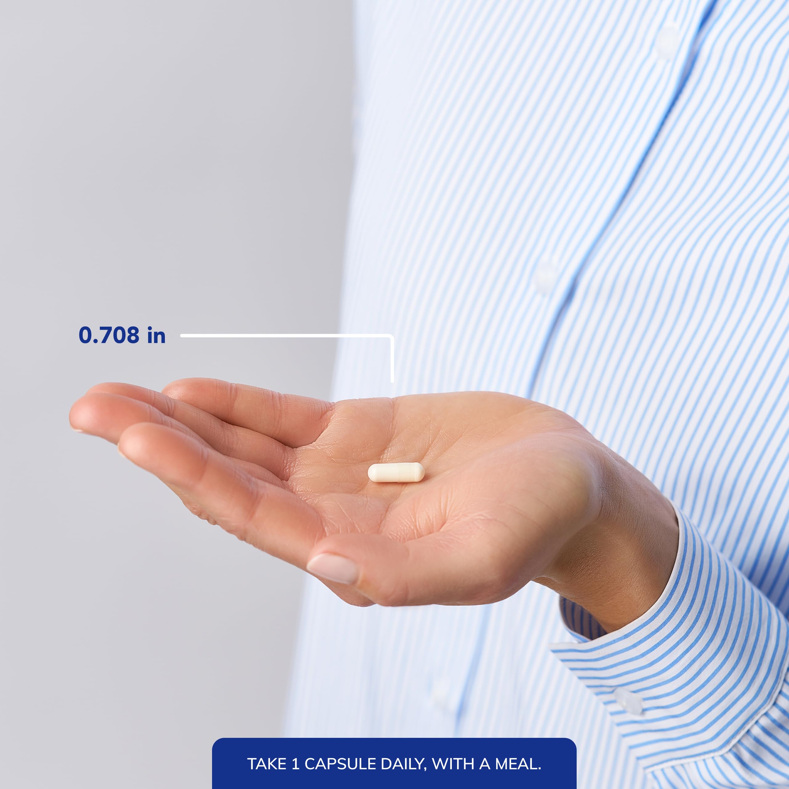 Pure Encapsulations Synergy K bottle in hand conveys portable daily wellness.