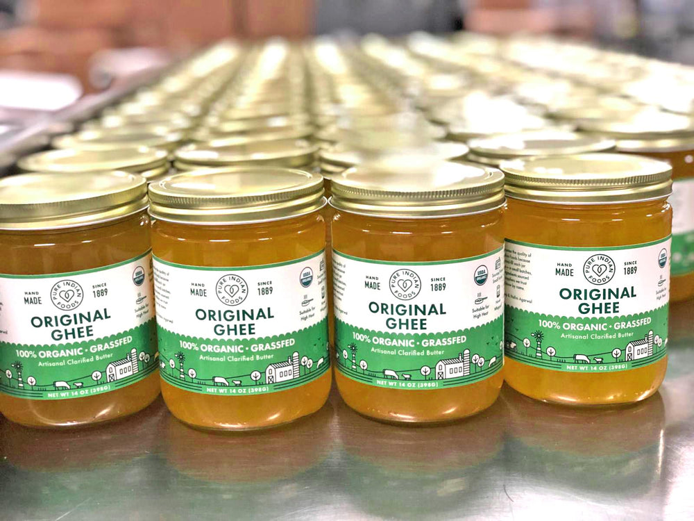 A Pure Indian Foods ghee jar in a family studio setting, emphasizing heritage