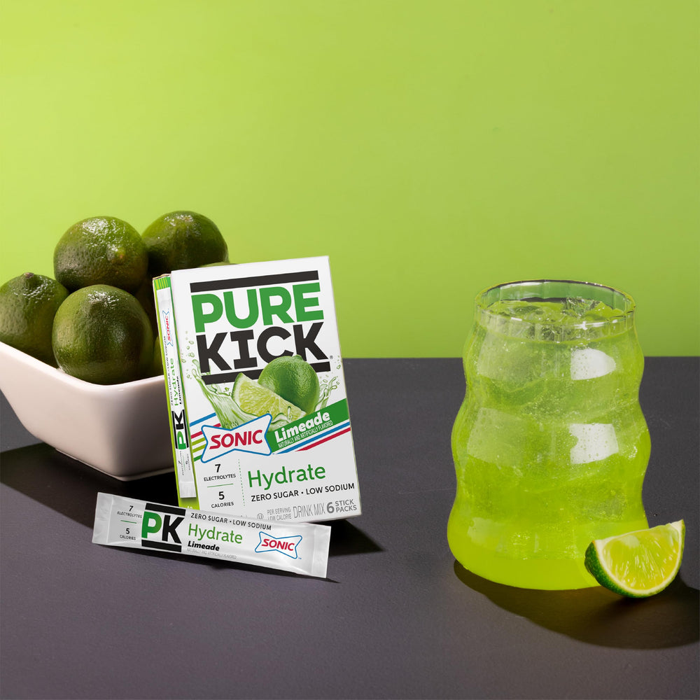 Active user enjoys Pure Kick during workout with hydration and focus