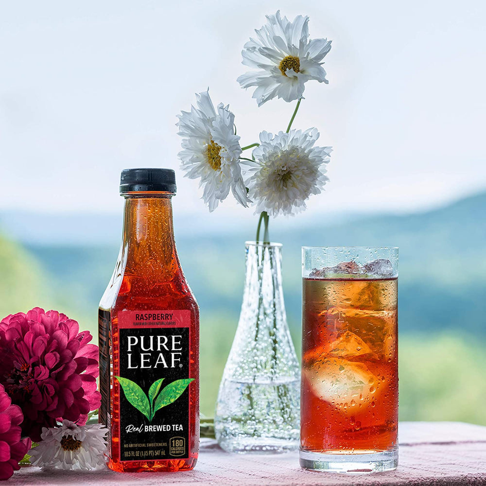 Pure Leaf Raspberry Iced Tea served in a glass with ice for a cool refresh.