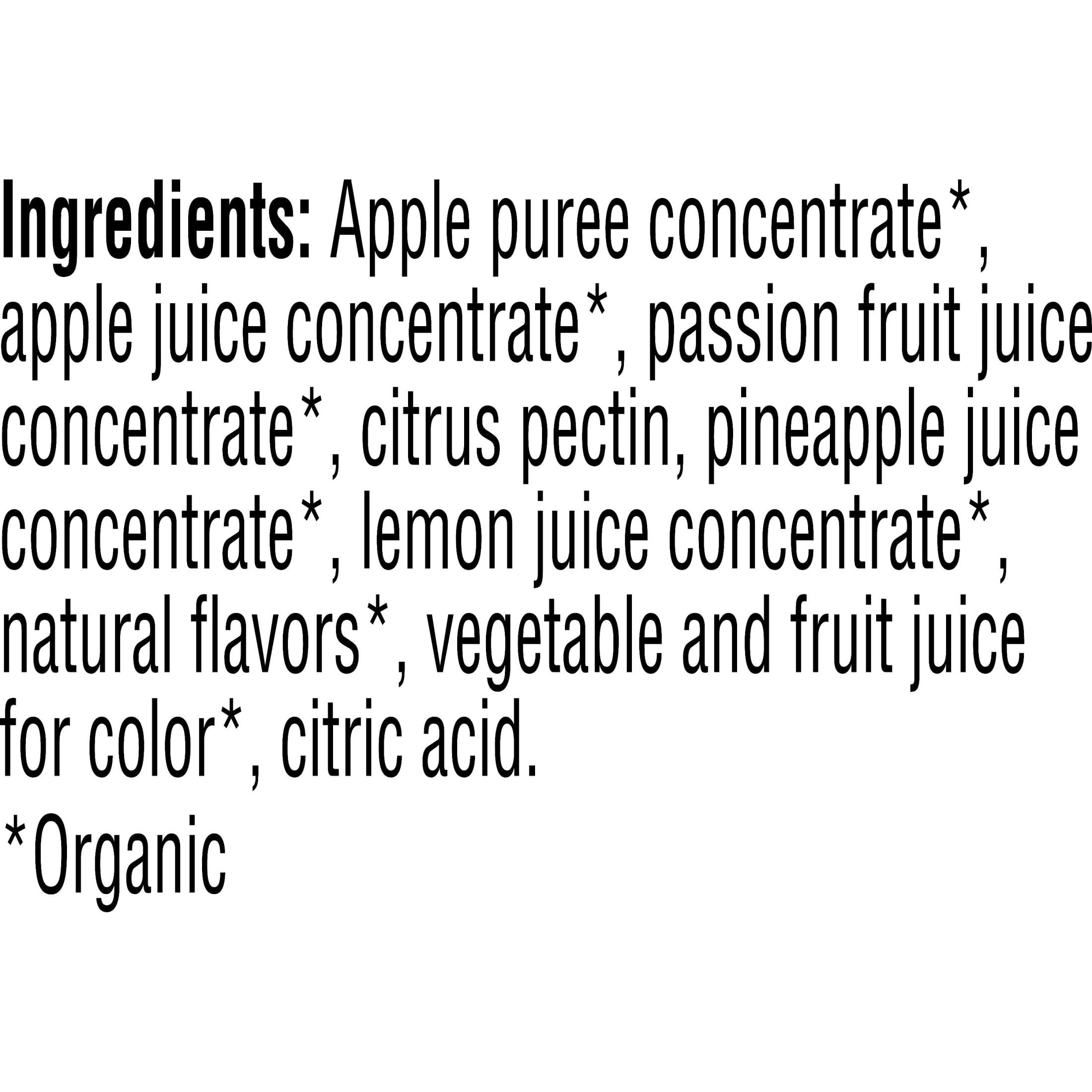Pure Organic layered fruit bars cross-section reveals vibrant pineapple and passionfruit layers.