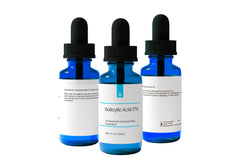 Close-up of Pure Original Ingredients dropper releasing controlled serum.