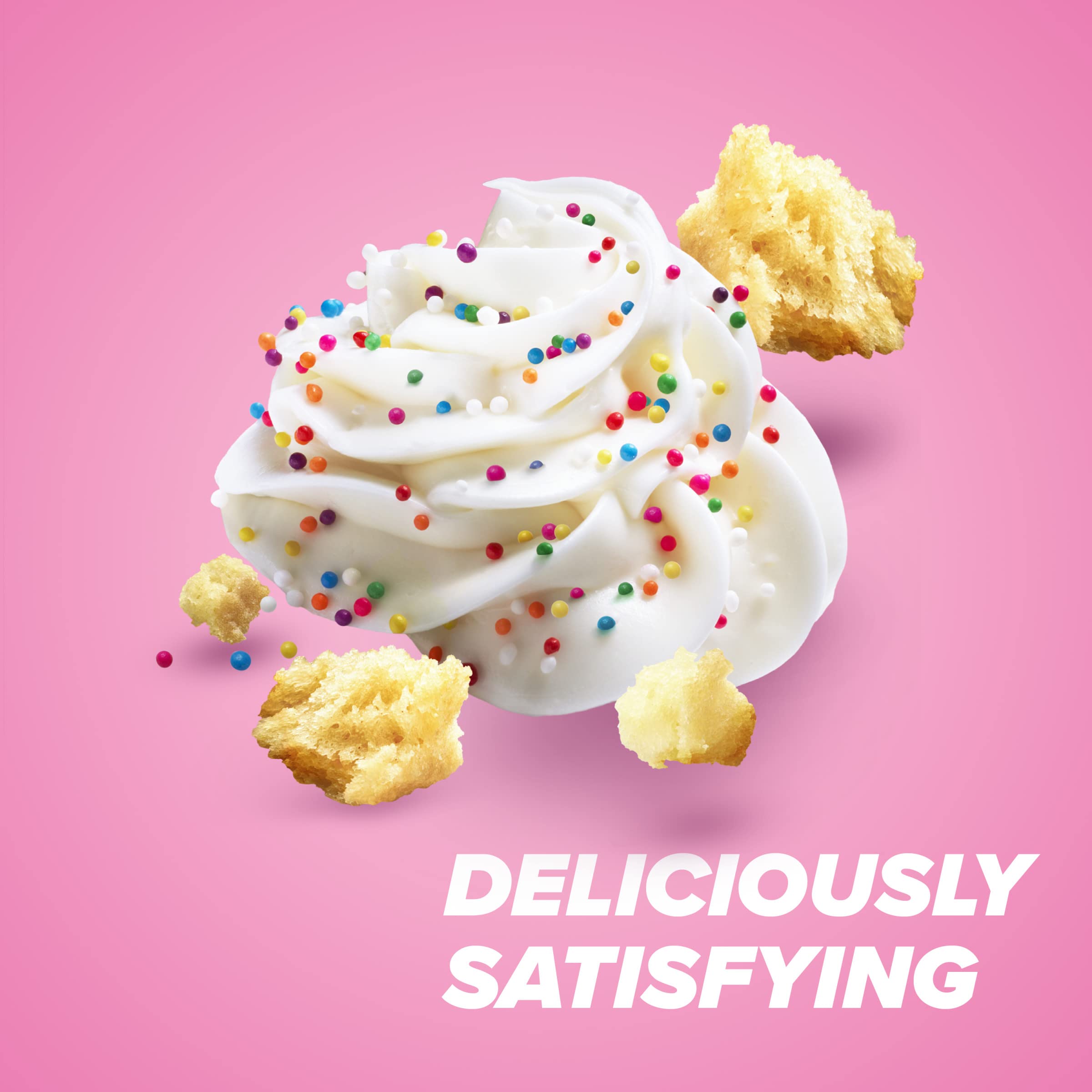 Pure Protein Birthday Cake bar bite shot, creamy frosting notes in every bite.