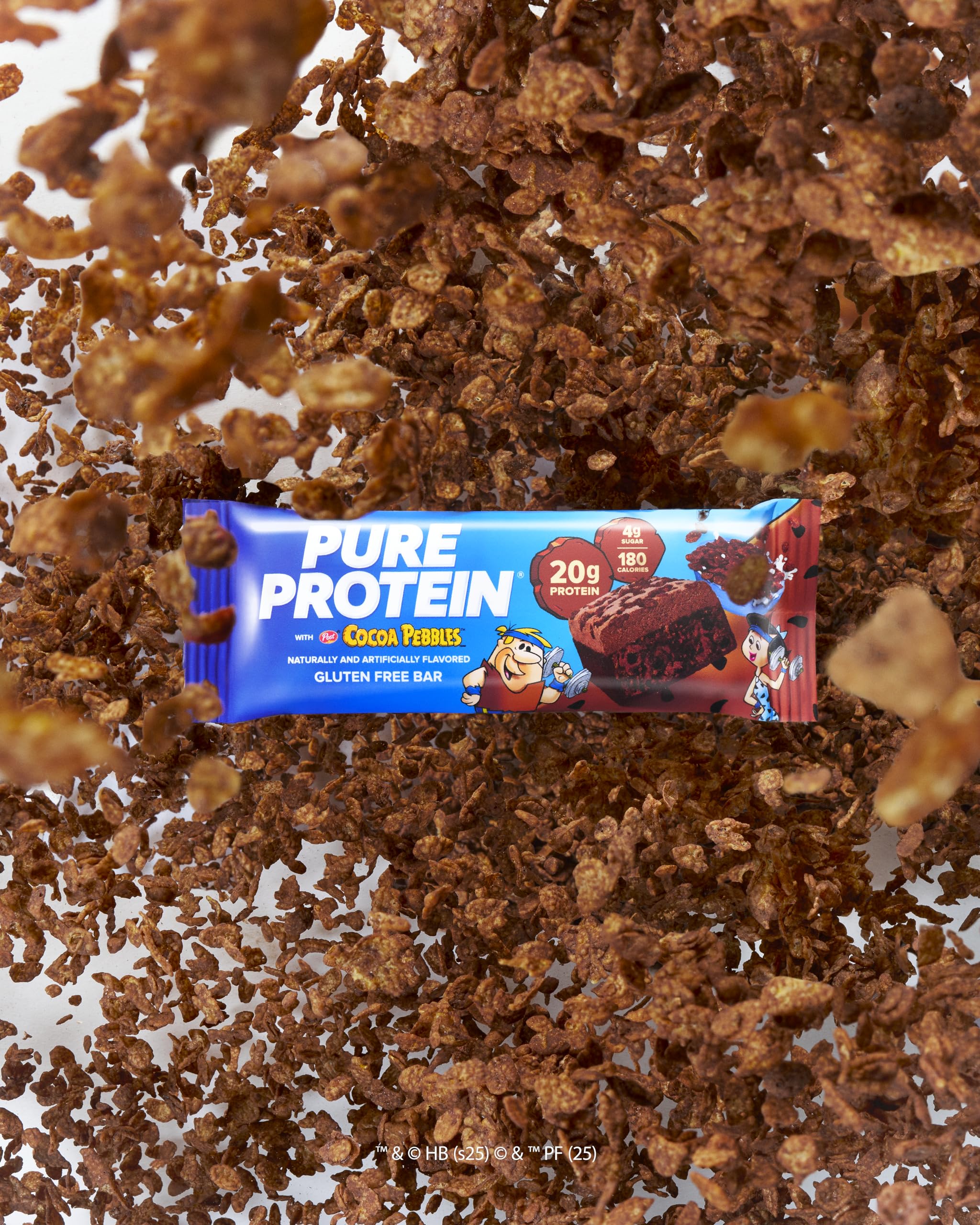 Crunchy, cereal-milk texture of Pure Protein Cocoa PEBBLES bar