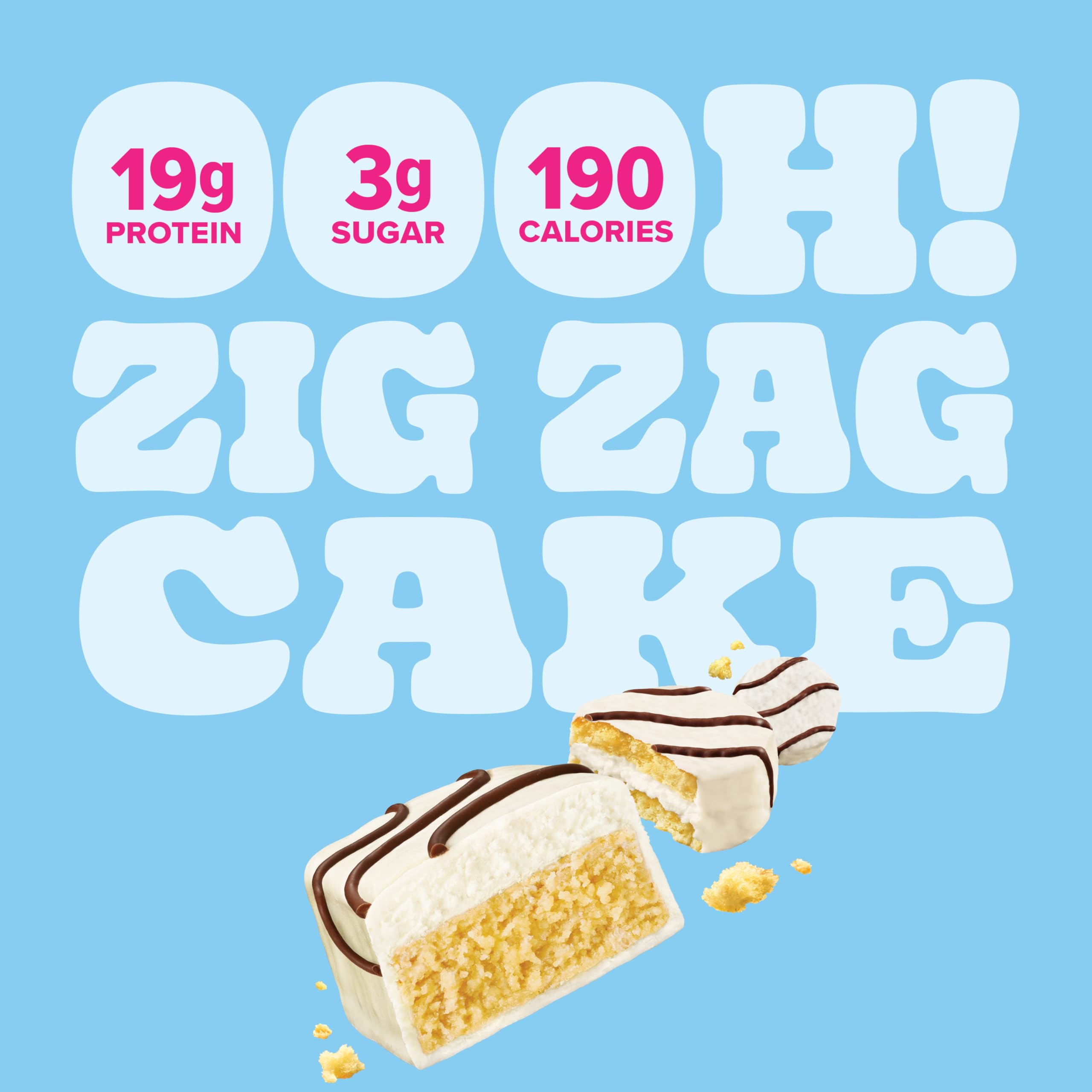 Pure Protein Zig Zag Cake Bar held in hand during workout break.