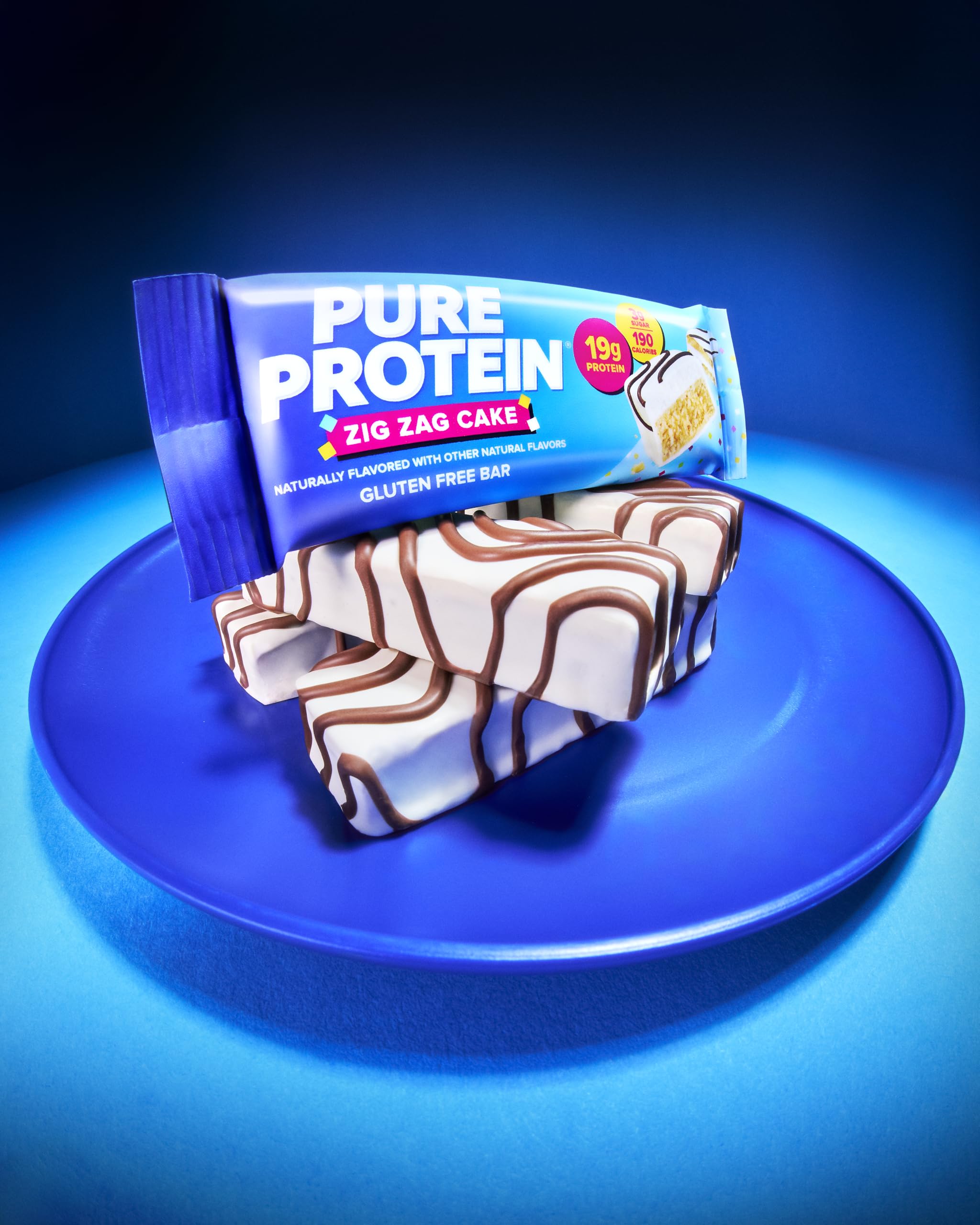 Nutrition facts for Pure Protein Zig Zag Cake Bar show 19g protein and 3g sugar.