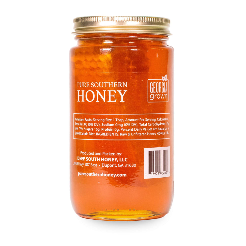Pure Southern Honey honeycomb close-up in jar showing texture and comb