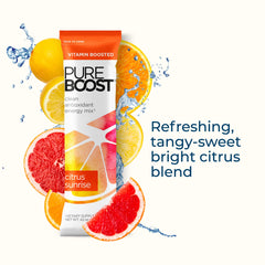 Glass of Pureboost energy drink showing vibrant Citrus Sunrise color