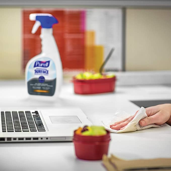 Purell 32 oz capped bottle ready for office use and rapid disinfection.