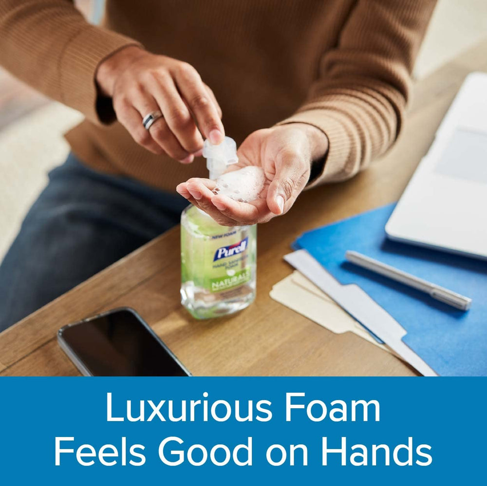 Purell Naturals Foam hands-using demonstrates quick application during daily tasks.