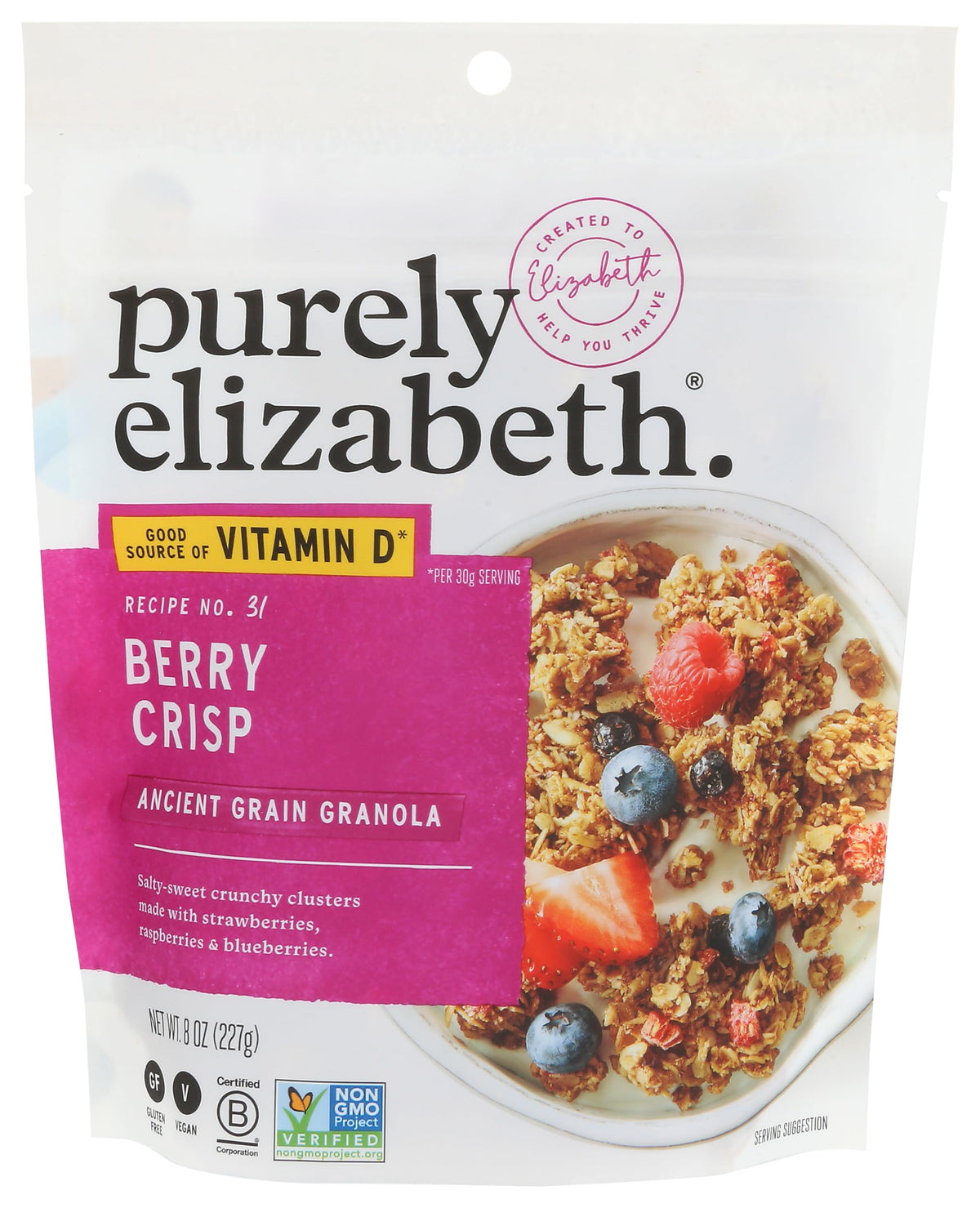 Purely Elizabeth Berry Crisp granola clusters with berries for a crunchy breakfast boost.