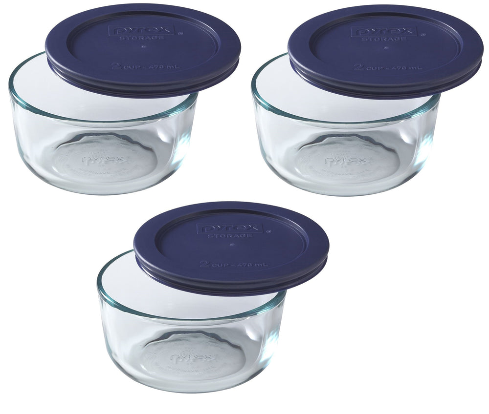 Pyrex 7200 2-cup glass bowl with a dark blue lid for fridge storage and microwave reheats.