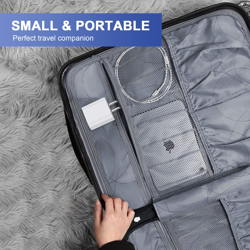 QASHQAI wall charger with USB-C port shown in compact form for travel