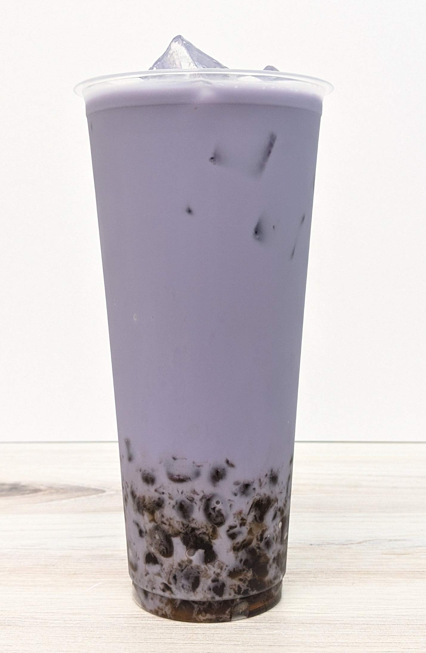 Qbubble taro powder being mixed to illustrate easy bubble tea making