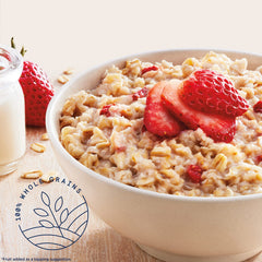 Quaker Instant Oatmeal Strawberries & Cream packets showing fruit flavors for quick breakfasts.