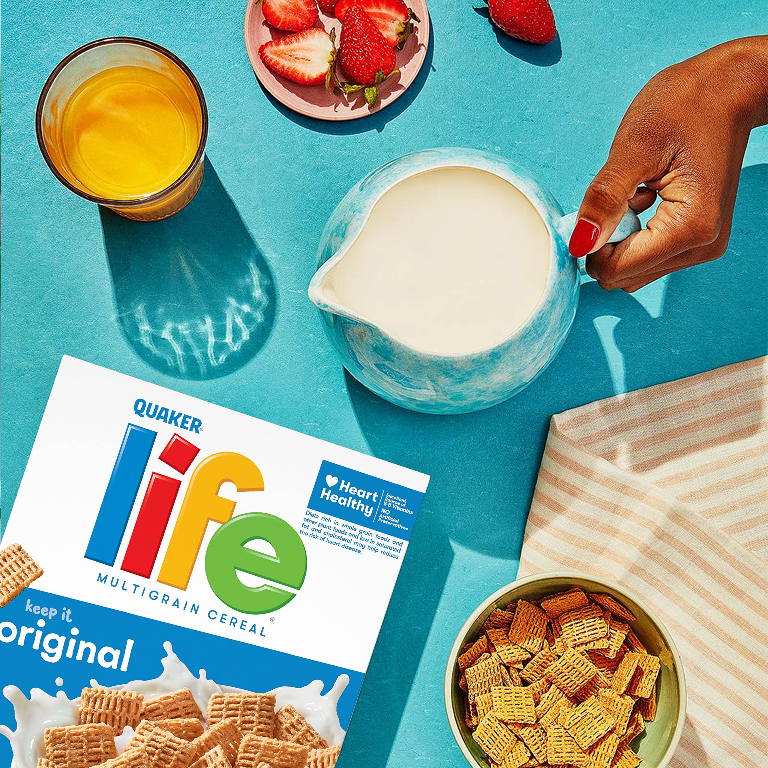 Quaker Life Cereal Original being poured into a bowl for a quick meal