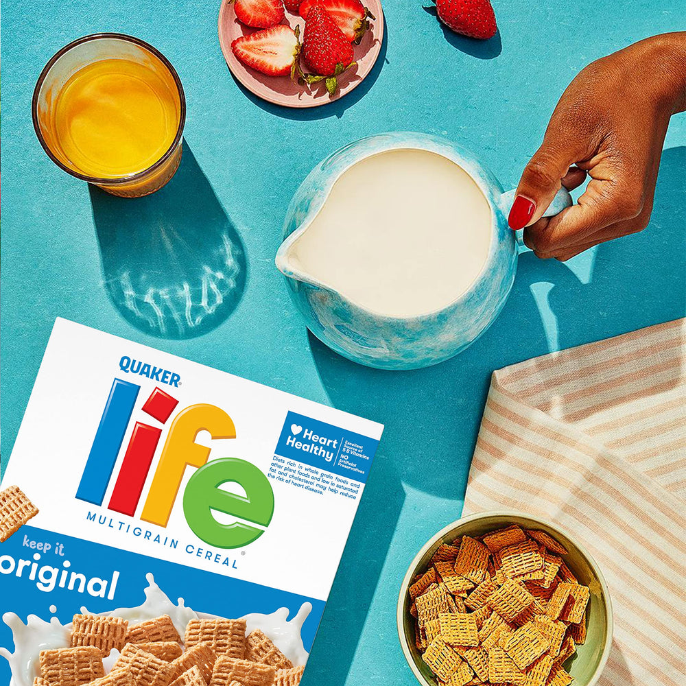 Quaker Life Cereal Original being poured into a bowl for a quick meal