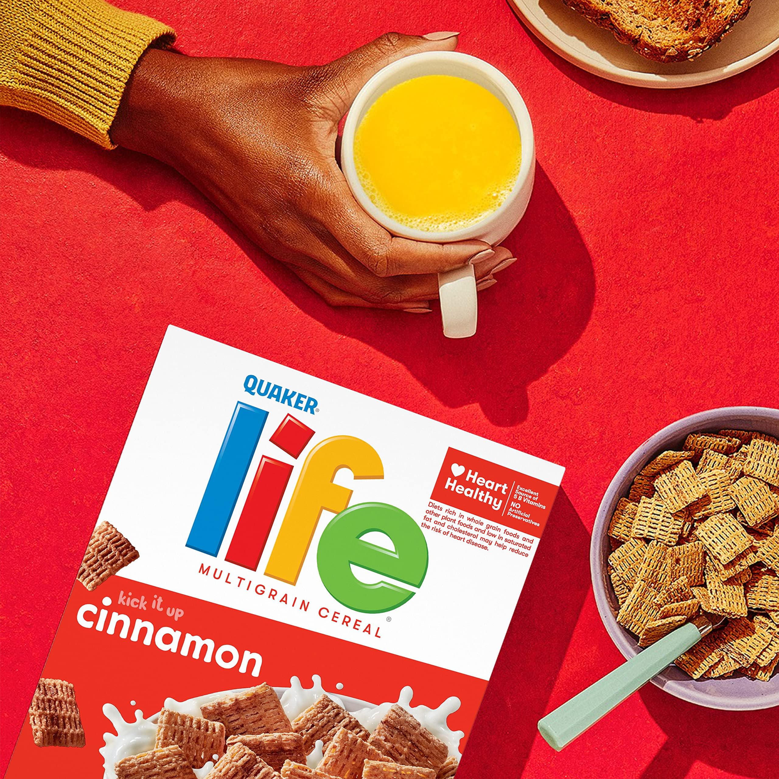 Quaker Life Multigrain Cinnamon with spoon and bowl for a warm breakfast.