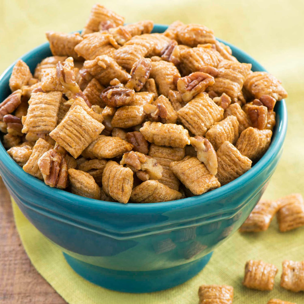 Visual of whole grains emphasizes the heart-healthy base of the cereal.