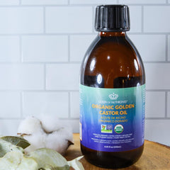 QUEEN OF THE THRONES Organic Golden Castor Oil label highlights organic, pure formula