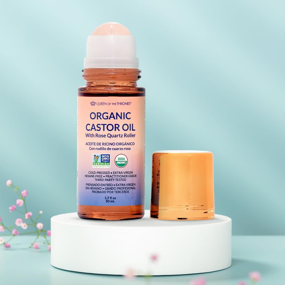 QUEEN OF THE THRONES Rose quartz roller close-up highlights soothing application